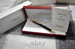 Cartier ballpoint pen, small model, black lacquer body, gold-finish FULL SET
